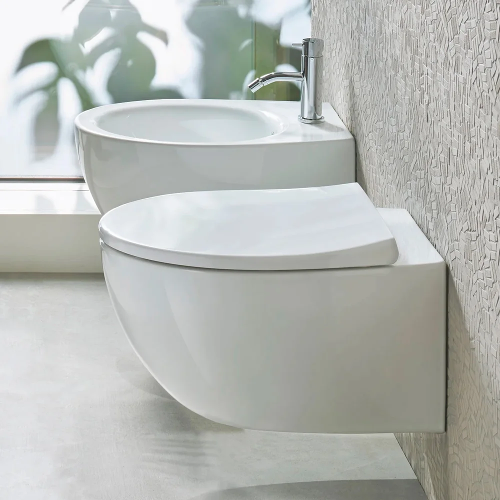 Унитаз подвесной безободковый Catalano Italy 52x37 Newflush с крышкой и набором фиксаторов , белый (0711520001_0751100001_9056060000) - Фото 2