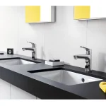Смеситель для умывальника Hansgrohe Focus 100 со сливным гарнитуром, хром (31607000) - Фото 2